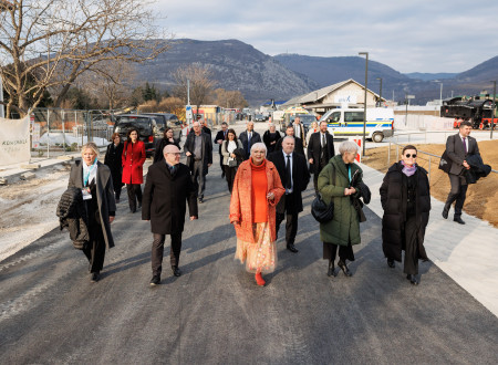 Distinguished guests with delegations are walking towards the place of reception