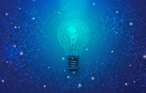 strategija m (graphic showing a light bulb on a blue background, which looks like a universe with stars connected as dots)