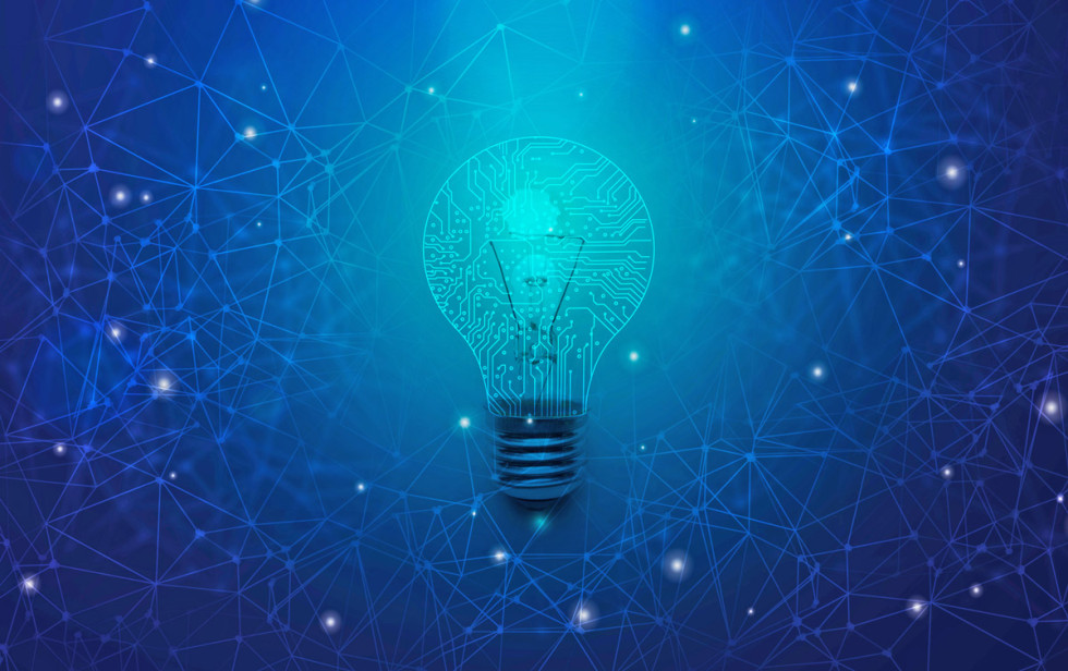 graphic showing a light bulb on a blue background, which looks like a universe with stars connected as dots
