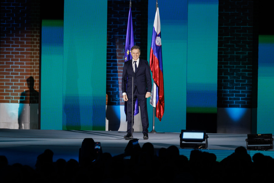 The Prime Minister stands on the stage and addresses the participants of the ceremony